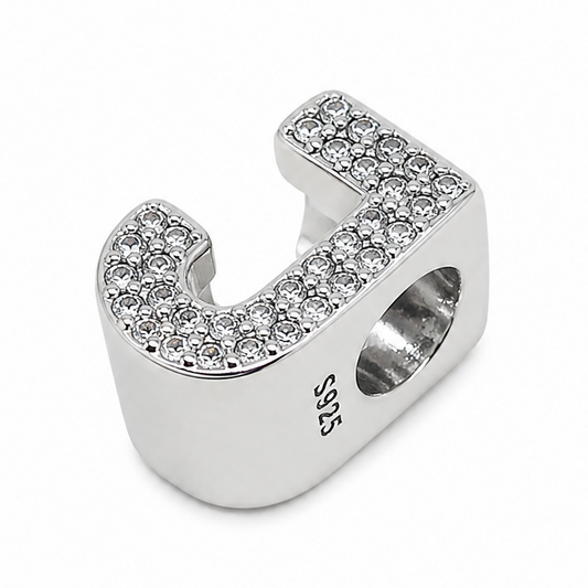 A sterling silver letter 'J' charm embellished with small clear rhinestones, with the hallmark stamp S925 clearly visible, shown on a clean white background.