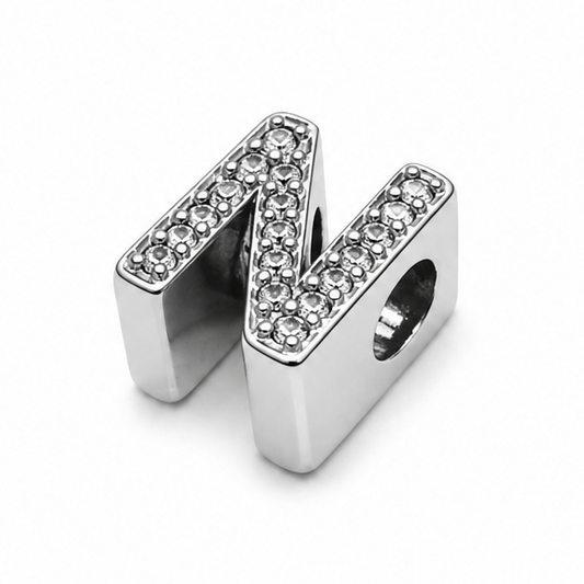 A sterling silver letter 'N' charm bead embellished with clear rhinestones, shown on a plain white background.