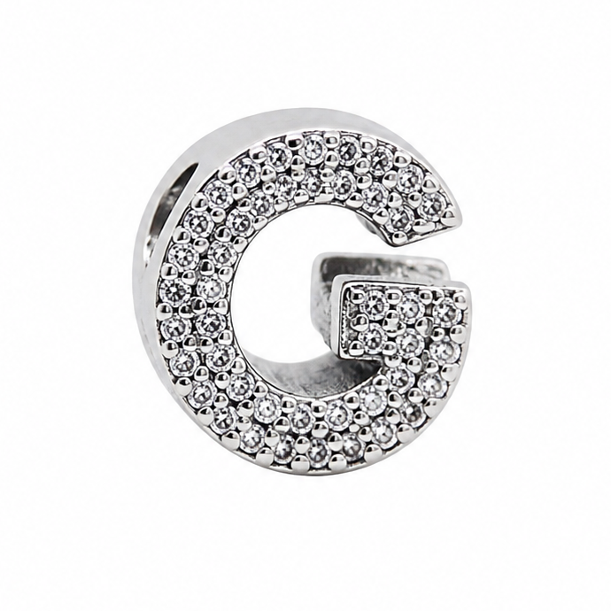 A sterling silver letter 'G' initial charm embellished with clear pavé stones, shown on a plain white background.