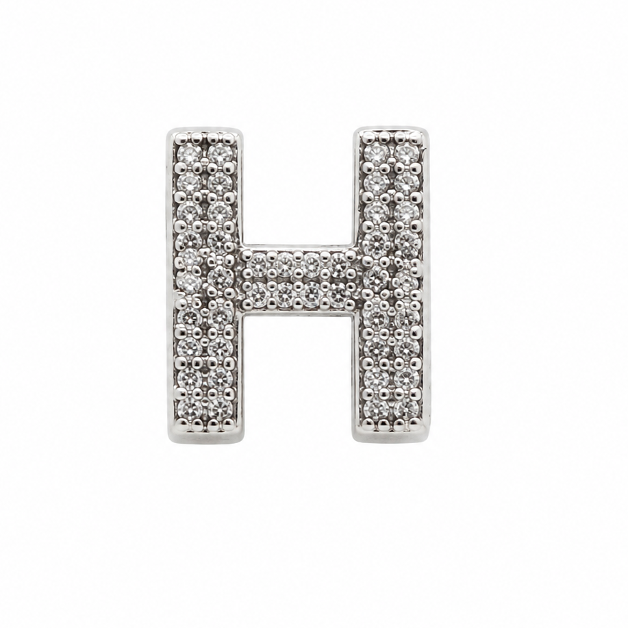 A sterling silver letter 'H' charm embellished with pavé-set clear crystals, shown on a plain white background.