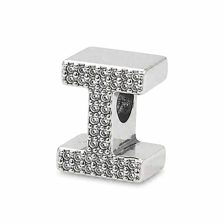 A sterling silver letter I initial charm with sparkling stones on the front of the letter, shown on a clean white background.