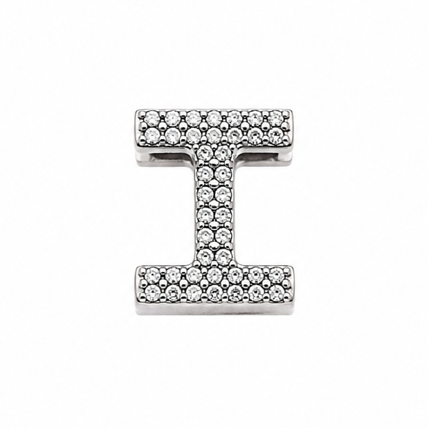 A sterling silver letter 'I' initial charm paved with small clear stones, centered on a plain white background.