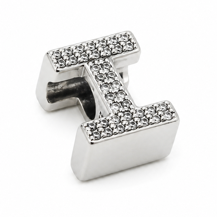 A sterling silver letter 'I' charm embellished with small clear rhinestones, shown on a clean white background.
