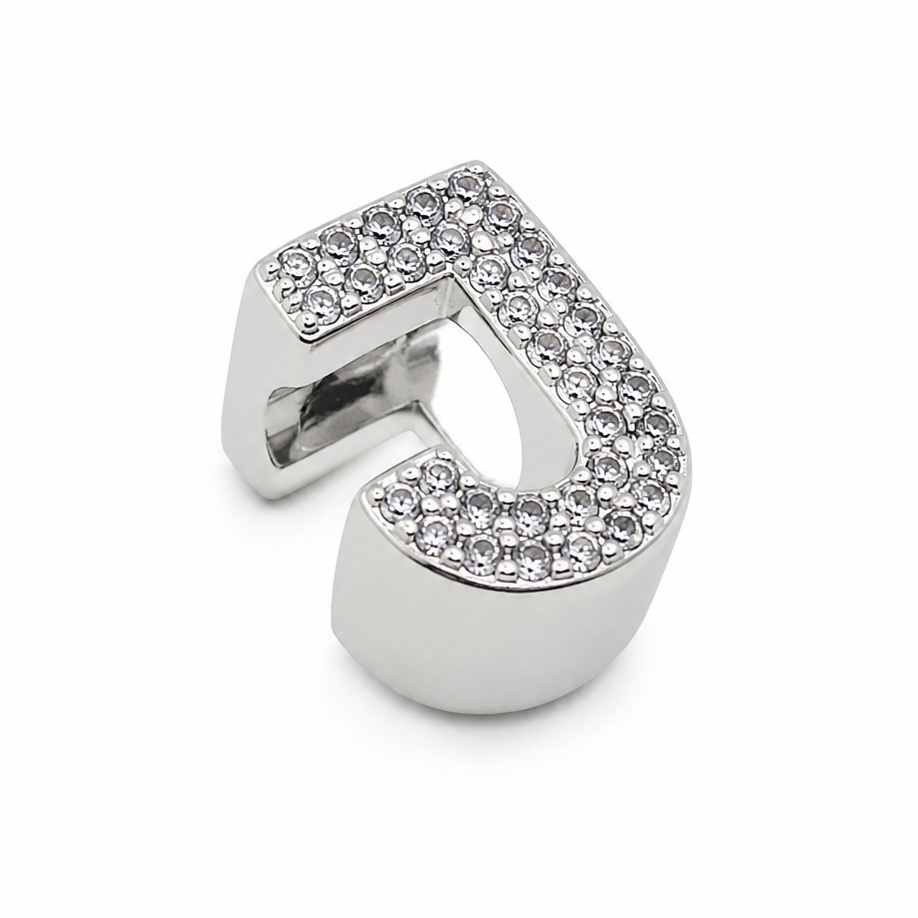 A sterling silver letter 'J' charm embellished with small clear rhinestones, shown on a clean white background.