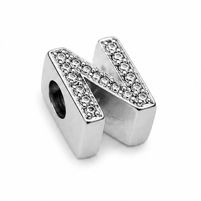 A sterling silver letter 'N' charm bead embellished with clear rhinestones, shown on a plain white background.