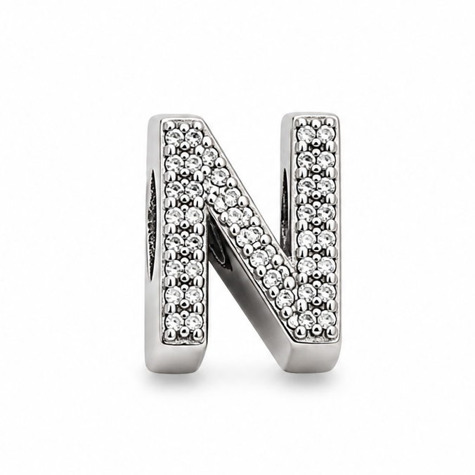 A sterling silver letter 'N' initial charm embellished with pavé-set clear cubic zirconia stones, shown on a clean white background.