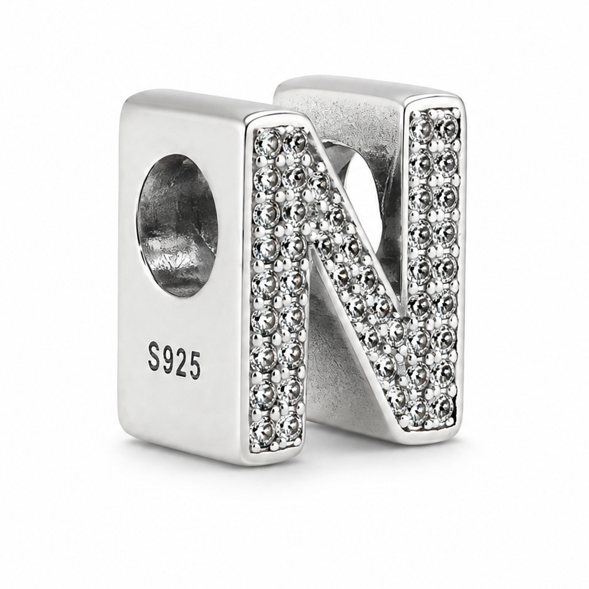 A sterling silver letter 'N' charm bead embellished with clear rhinestones, shown on a plain white background.