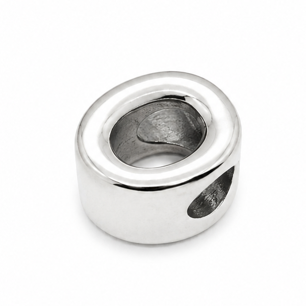 A sterling silver letter 'O' charm bead photographed from the back to show polished silver. On a white background 