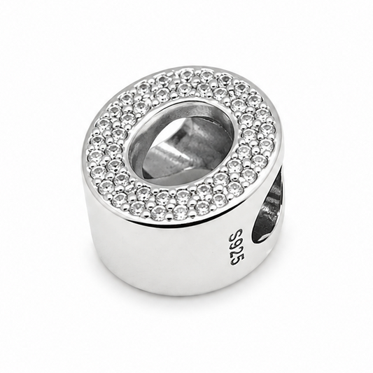 A sterling silver letter 'O' charm bead embellished with clear rhinestones and '925' silver purity stamp, shown on a plain white background.